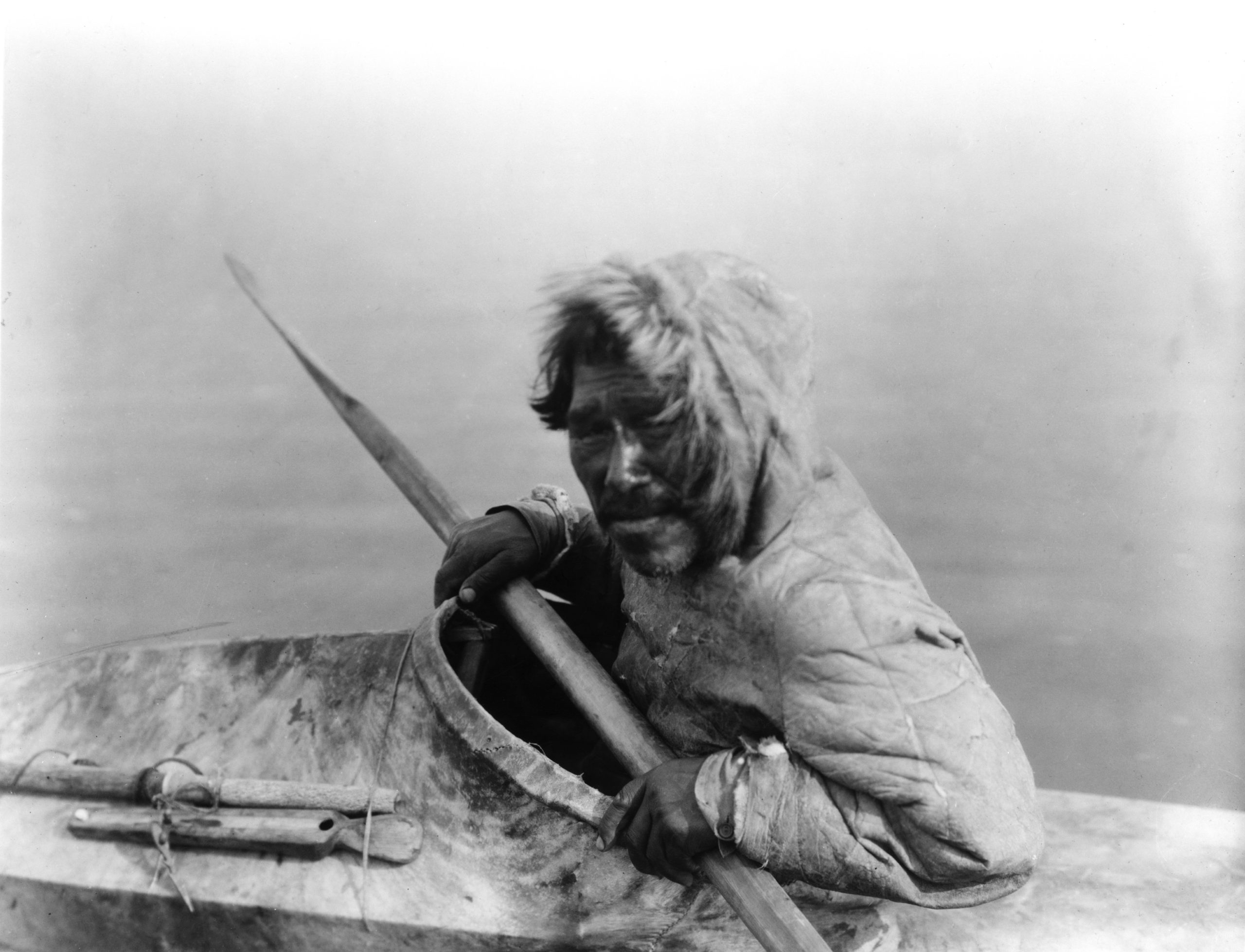 Inuit Man in early kayak