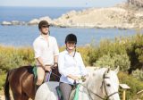 couple enjoying horseback ride