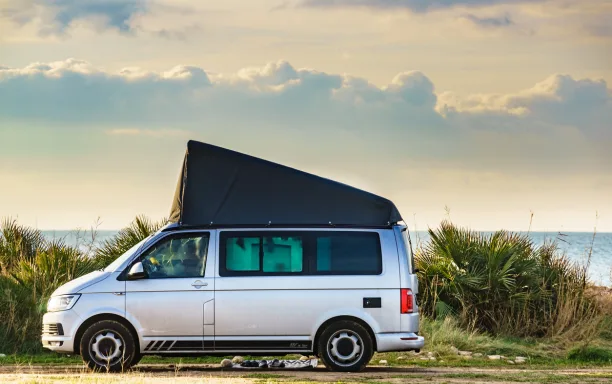 vw campervan on beach