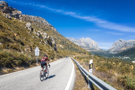 road biking uphill spain mountains