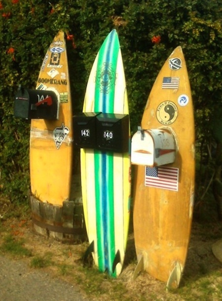 These surfboards have been turned into mailbox holders