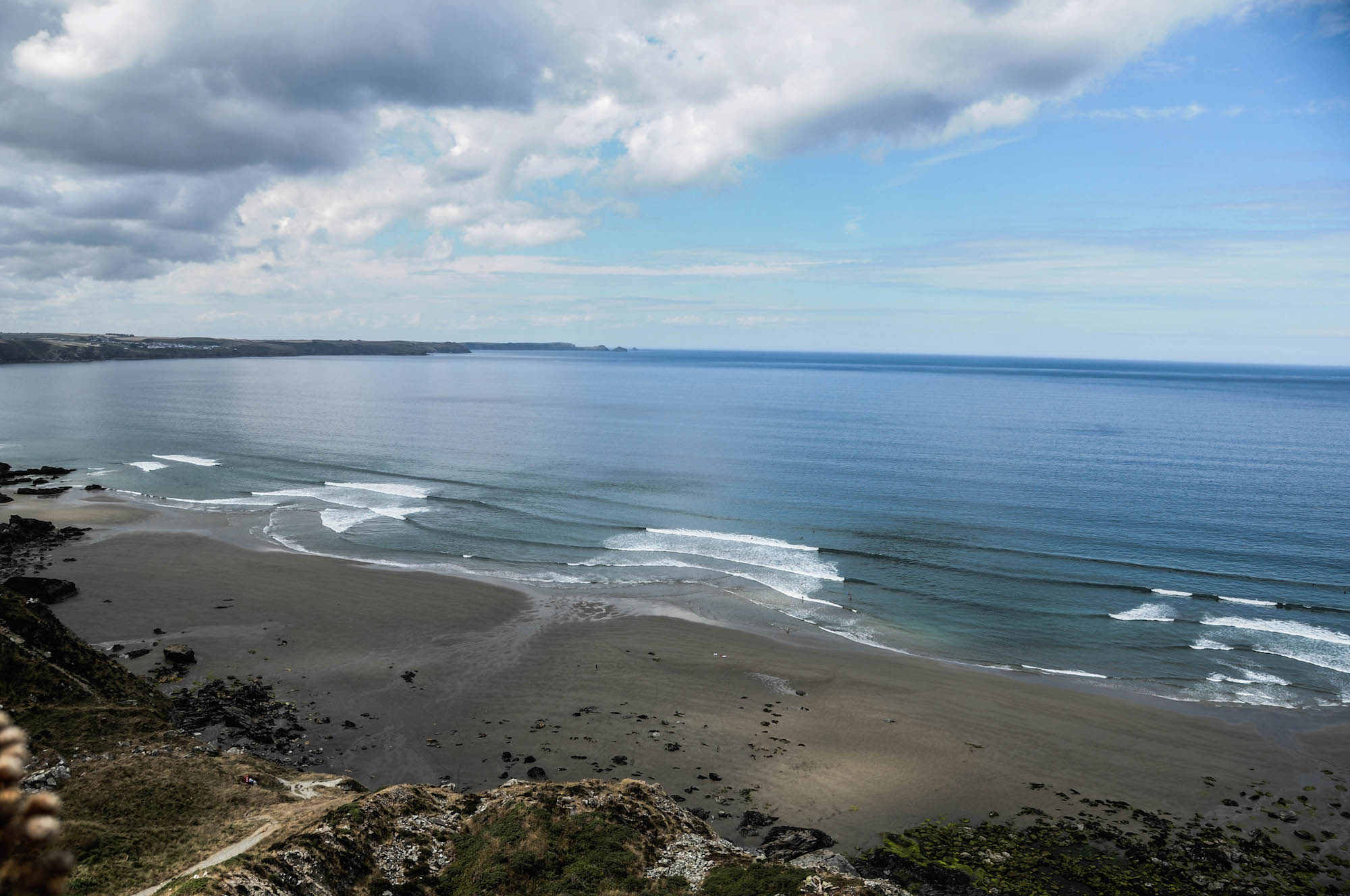 Rip Currents: waves breaking over sandbars with rip currents in between