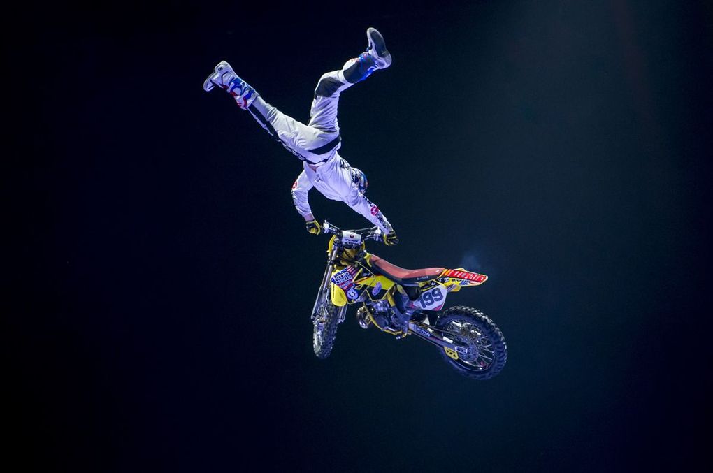 Travis tweaking out, high above the arena - Photo: Nitro Circus