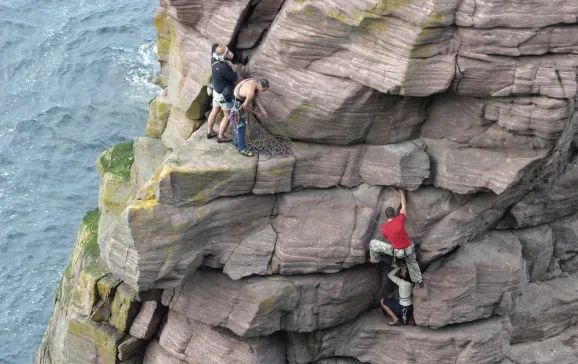 1536 climbers accending the old man of stoer in the scottish highlands