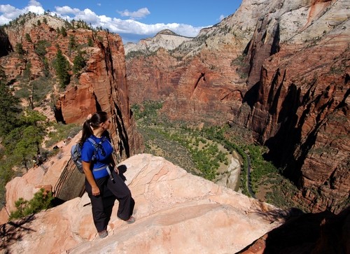 1461 woman hiking angels landing in zion national park credit shutterstock