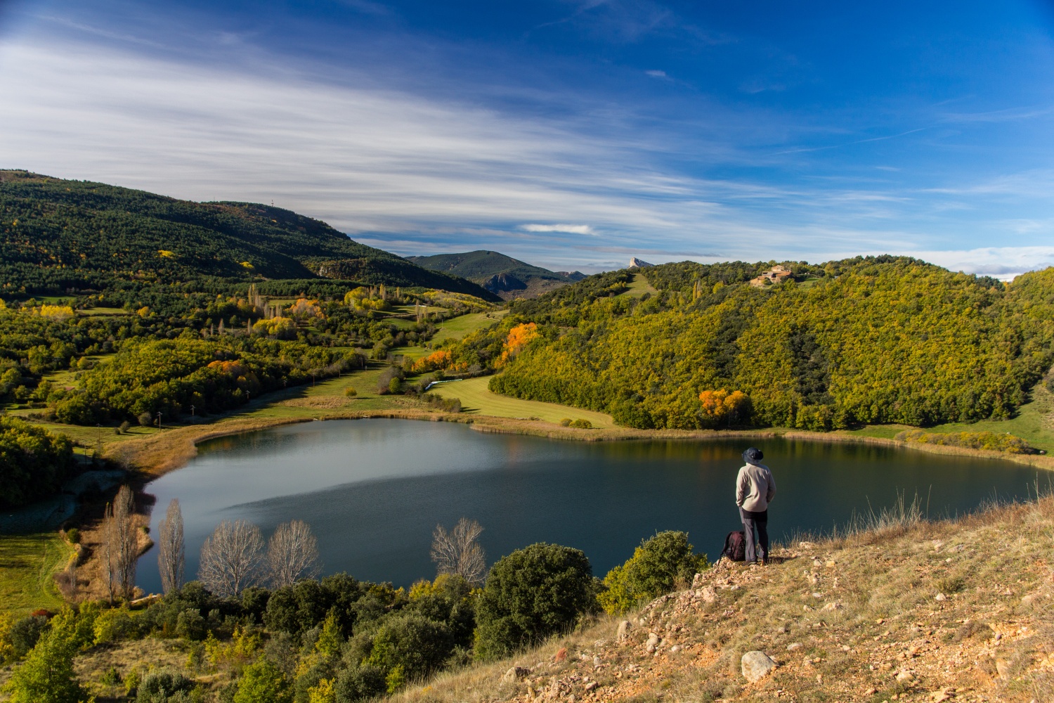 Person stood by side of lake - El cinquè llac copia, Catalonia