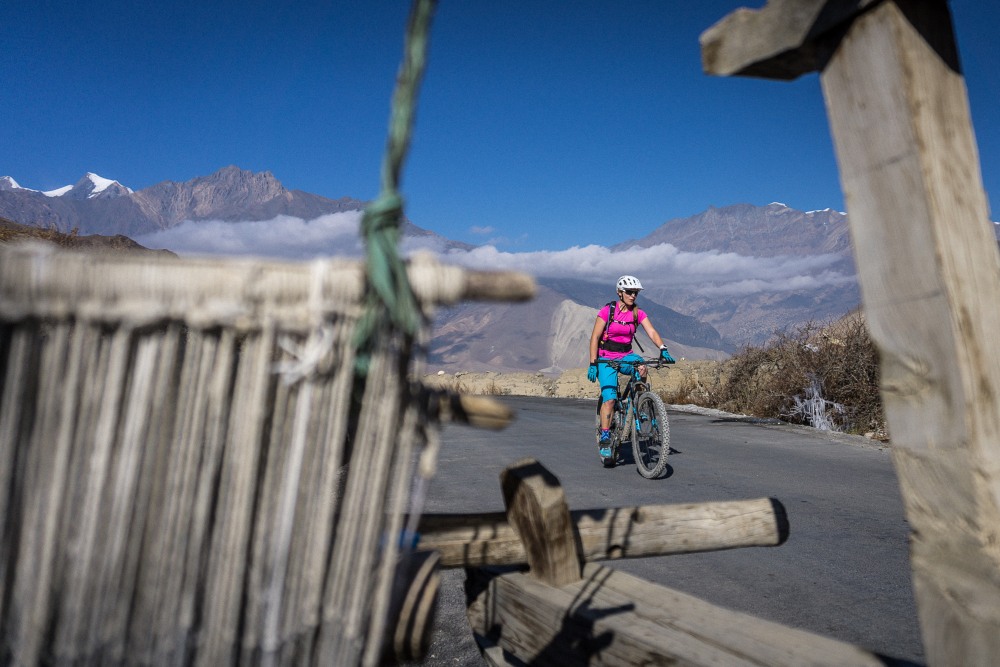 Catriona rides the lunar-like landscape under the watch of some of the world’s tallest peaks ©Donald Shearer.jpg