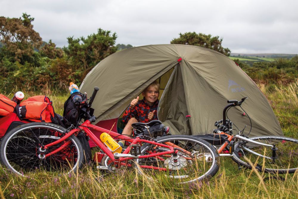 Daniel approves of the wild camping set up on Dartmoor.jpg