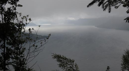 Dramatic fjordscape as the sun breaks through