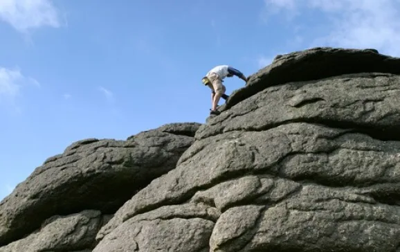 1822 climber tor devon dartmoor credit peter clark