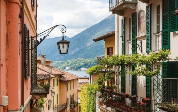 a glimpse of lake como down a bellagio street