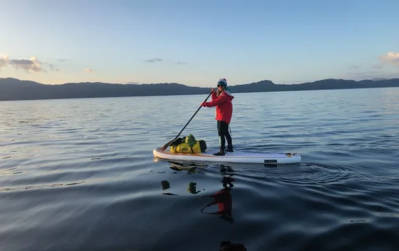 paddling along on calm waters