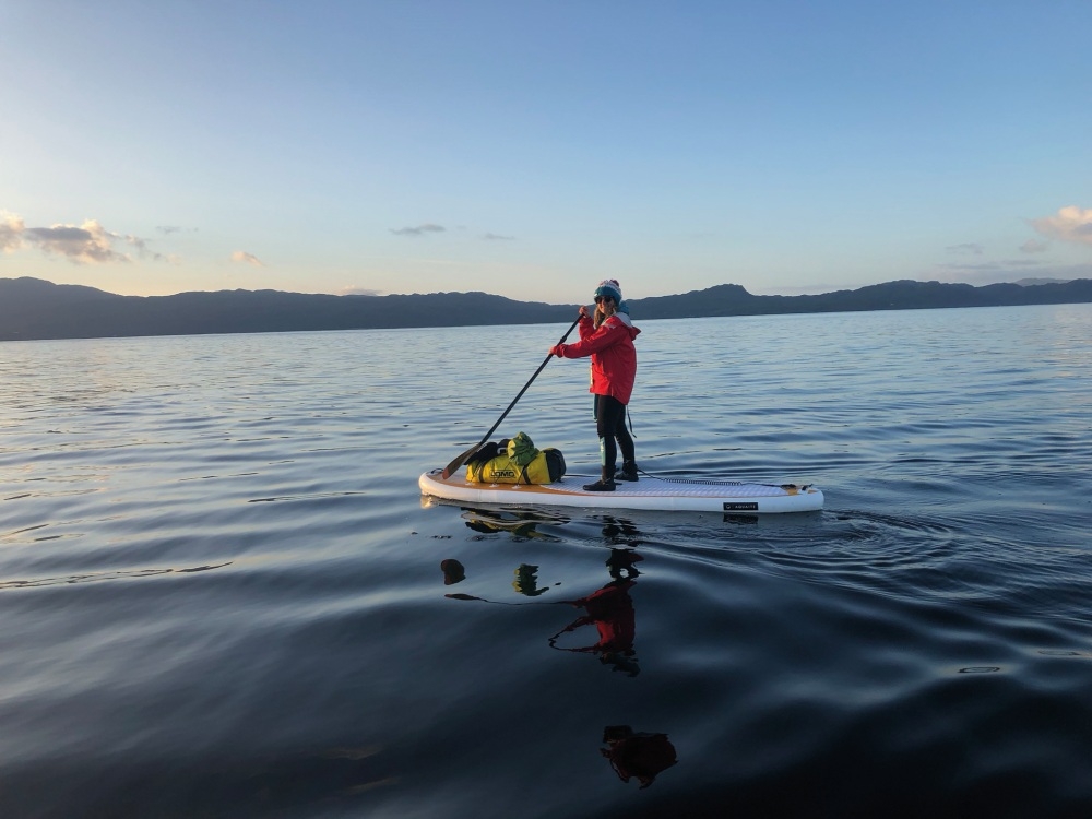 paddling along on calm waters