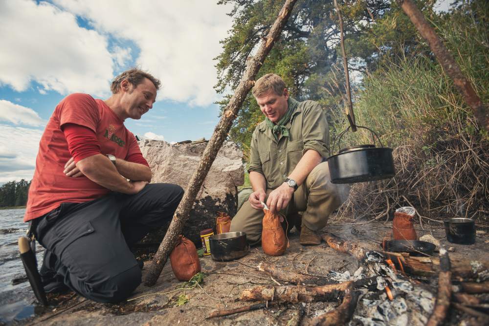 Pete round the campfire with Ray