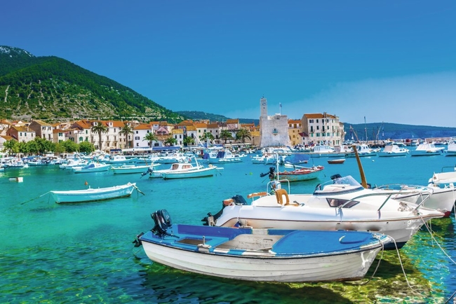 The vibrant colours of Komiza harbour in Vis, Croatia.jpg