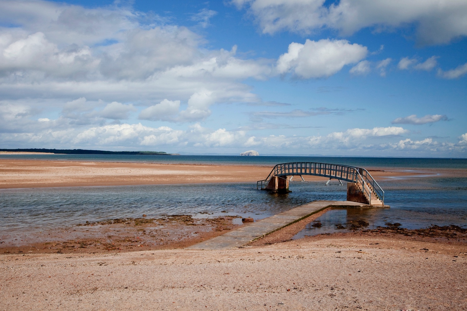 Coastline of Scotland on sunny day - Bridge to Nowhere, East Lothian