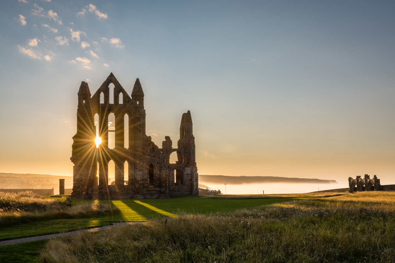 Sun shining through the Gothic ruins of Whitby Abby_Cleveland Way