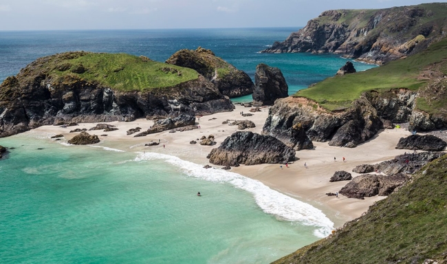 Beach at Kynance Cove with turquoise waters, Namparra campsite.jpg