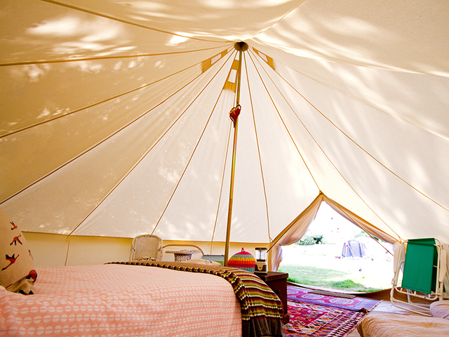 Inside one of the fantastic bell tents at Harry's Field campsite, New Forest.png