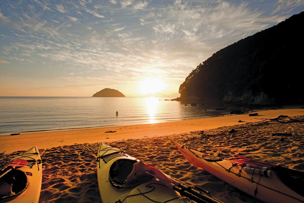 new zealand kayaks on beach