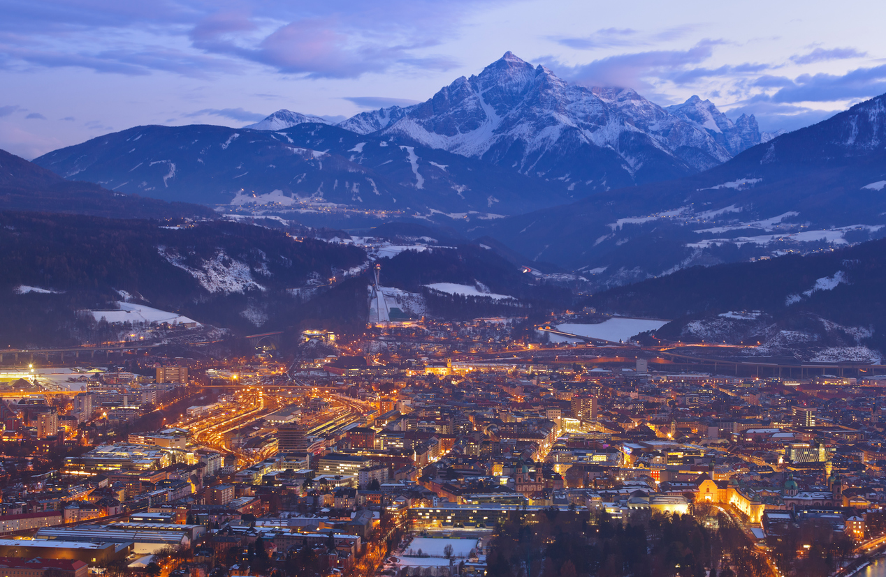 Innsbruck-waterfront-with-mountains-behind