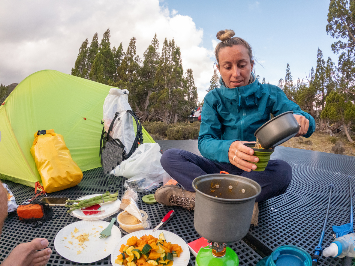 Woman-wild-camping-and-cooking