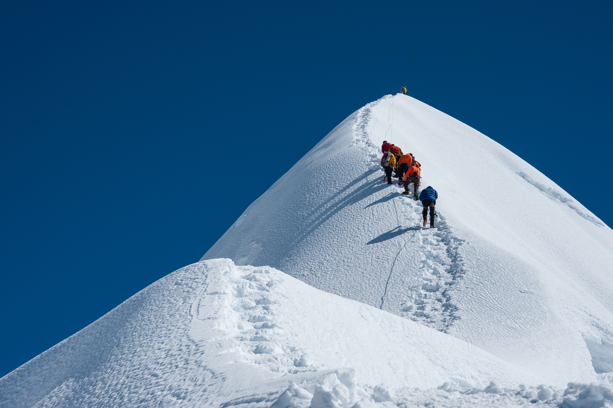 climbers-summiting-island-peak-nepal