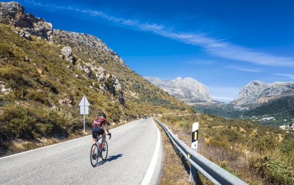 road biking uphill spain mountains